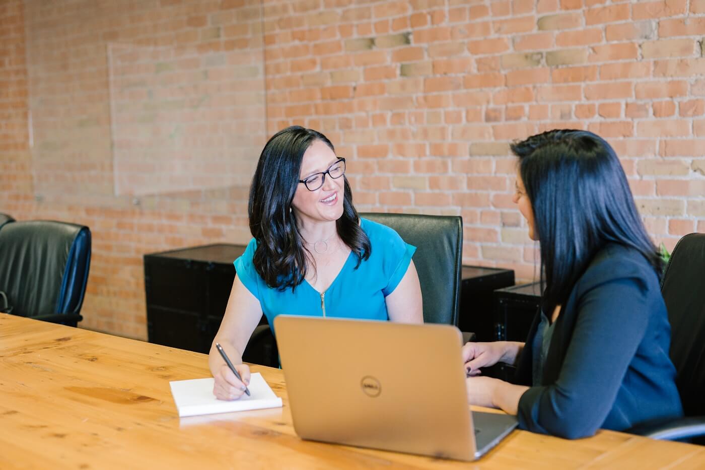 Professional reviewer checking documents in a modern office